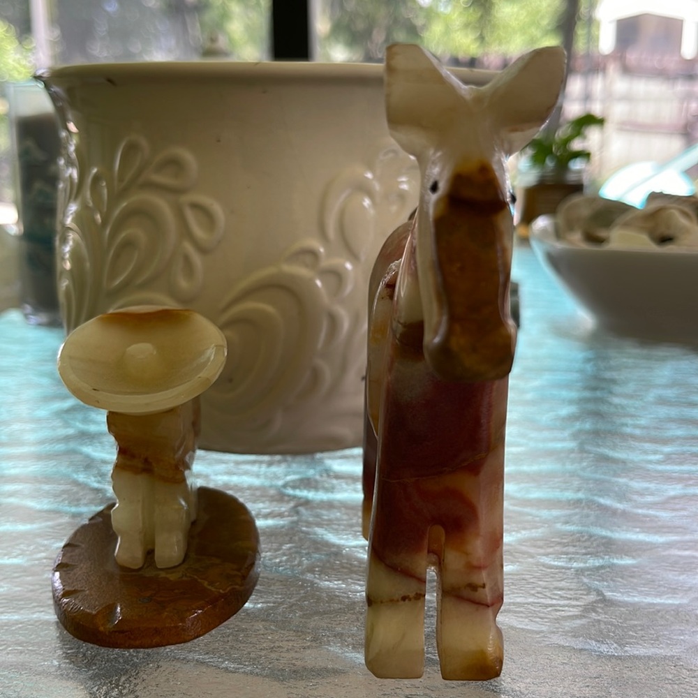 Marble horse and a man taking a siesta. Made in Mexico. It’s a set